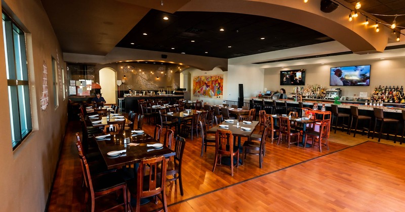 Interior, dinning area, tables and chairs ready for guests