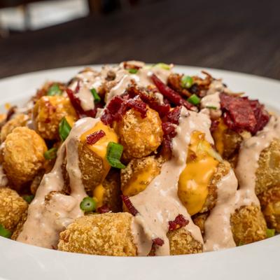 Tater tots, served, closeup.