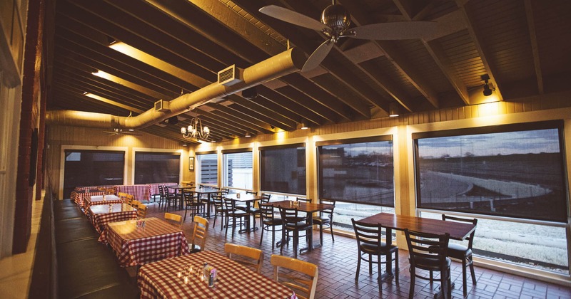 Interior, dining tables ready for guests