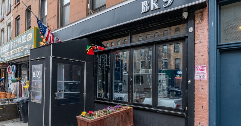 Exterior, front view to restaurant, sidewalk, entrance