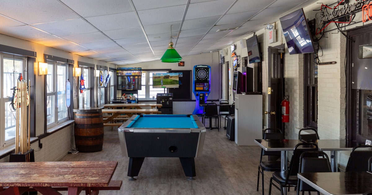 Interior, dining area with a pool table
