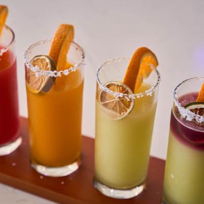 Margarita Flight featuring different flavors and colorful garnishes.