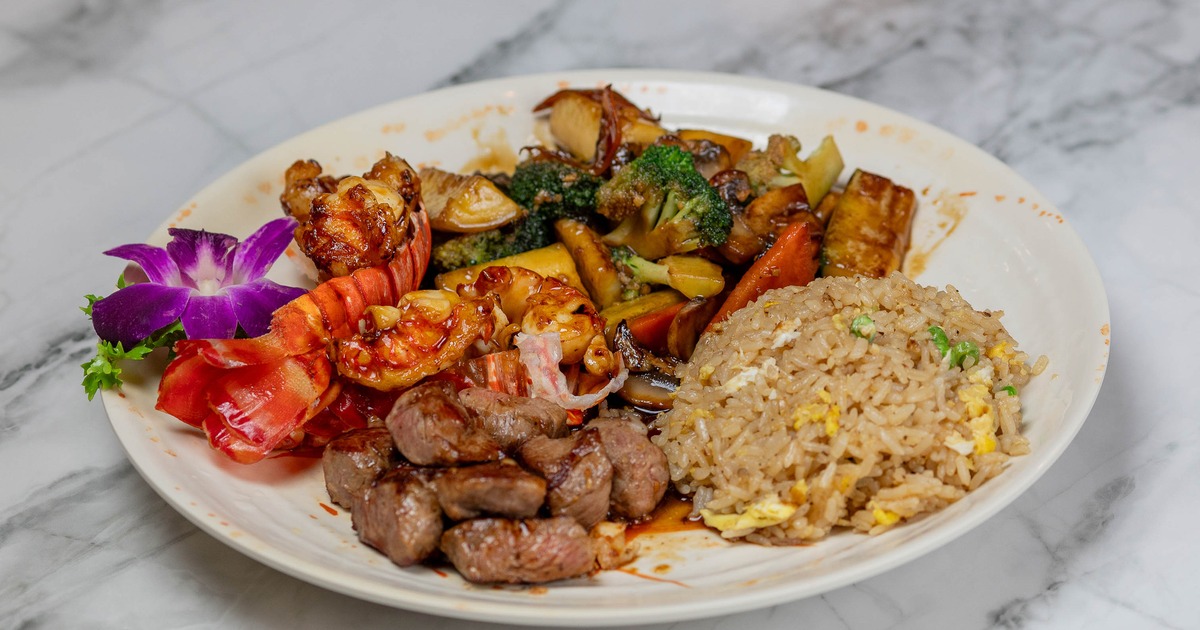 Filet Mignon and lobster, with rice and sauteed veggies