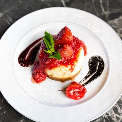 Goat Cheese Cheesecake with strawberries.