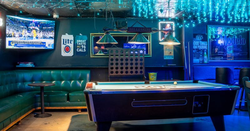 Vinyl sofa and a pool table