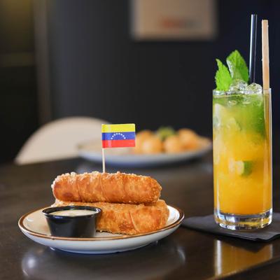 Bread dough sticks and passion fruit Mojito.