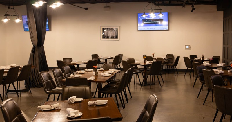 Interior, seating area with tables and chairs
