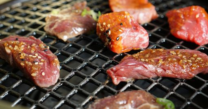 Yakiniku, meat being grilled, closeup