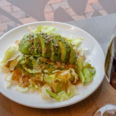 Avocado salad  with creamy sesame dressing.