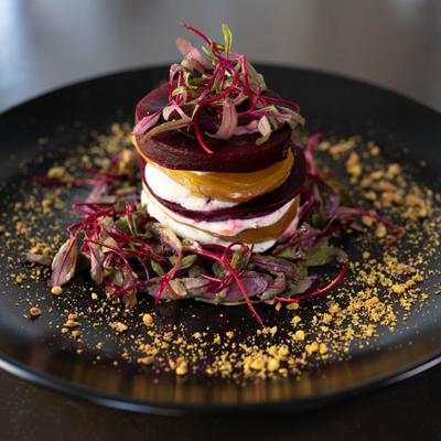 Red and gold beets layered with whipped mint goat cheese.