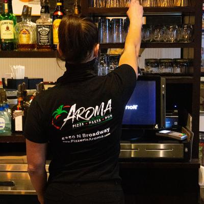 Staff member working behind the bar