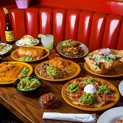 Assorted Mexican dishes on a table.