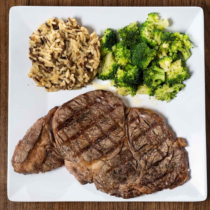 Hand - Cut Ribeye Steak* photo