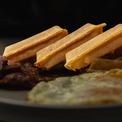Waffles, eggs, and pork.