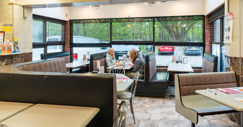 Interior, tables, chairs and seating booths