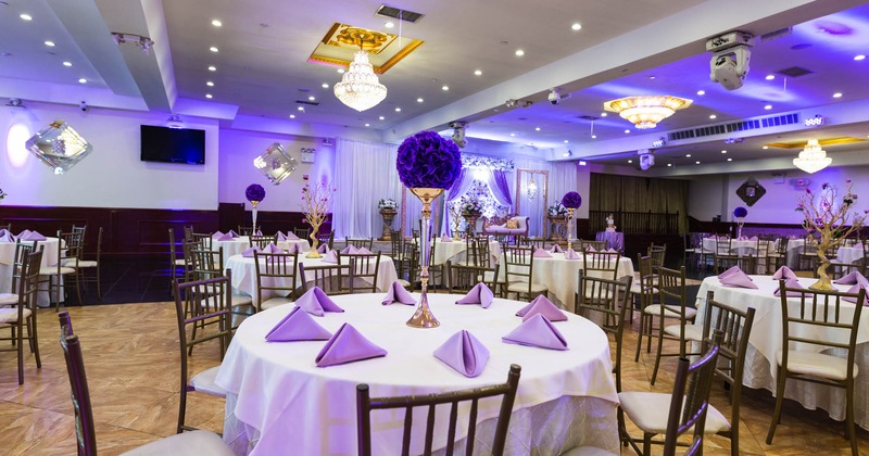 Round decorated tables ready for guests