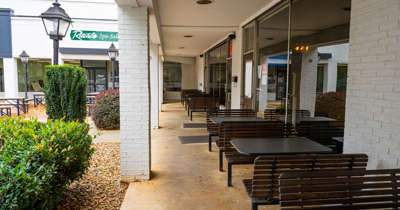 Tables and benches in patio area