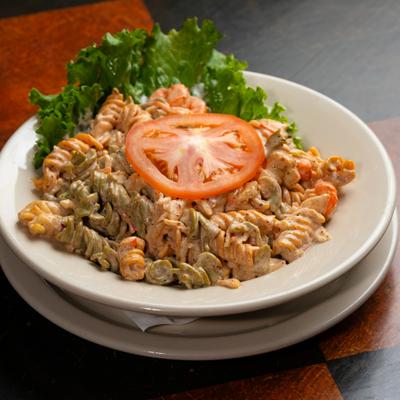 Seafood Pasta Salad - shrimp, scallops, and crabmeat w/ spiral pasta tossed with our special dressing. Served Hot or Cold.
