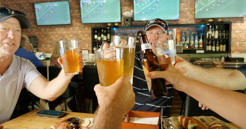 The guests toast with beer