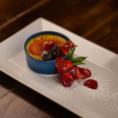 Burnt cream with fruit sauce.