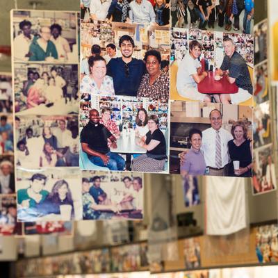 Wall of photographs inside the restaurant.