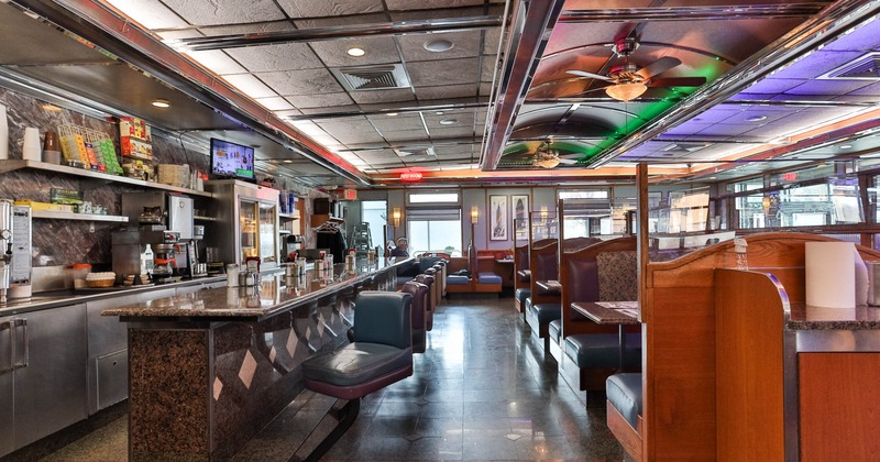 Interior, bar area, seating booths lined up