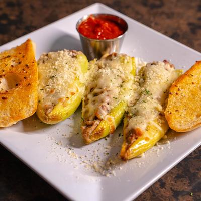 Stuffed banana peppers, served with garlic toast and marinara.