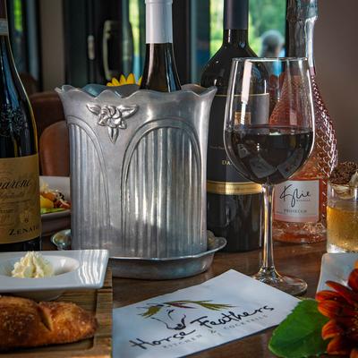 Interior, Assorted Fine Wines displayed on a table, close up.