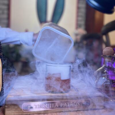 A drink presentation in smoke.