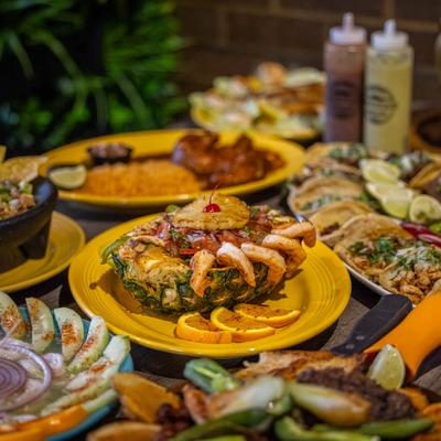 Various dishes and condiments on a table.