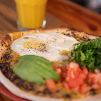 Served breakfast and orange juice.