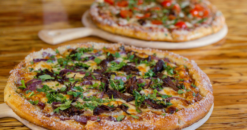 Pizzas on the table closeup