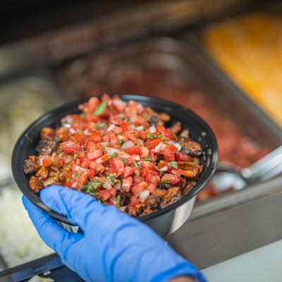 Taco bowl preparation.