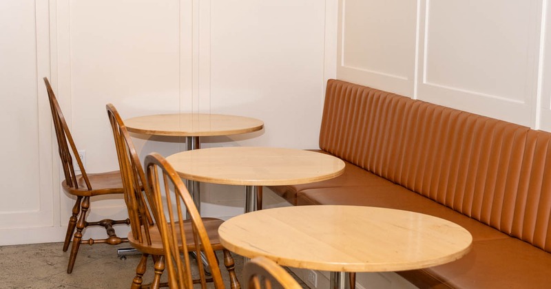 Interior, banquette seating with tables and seats