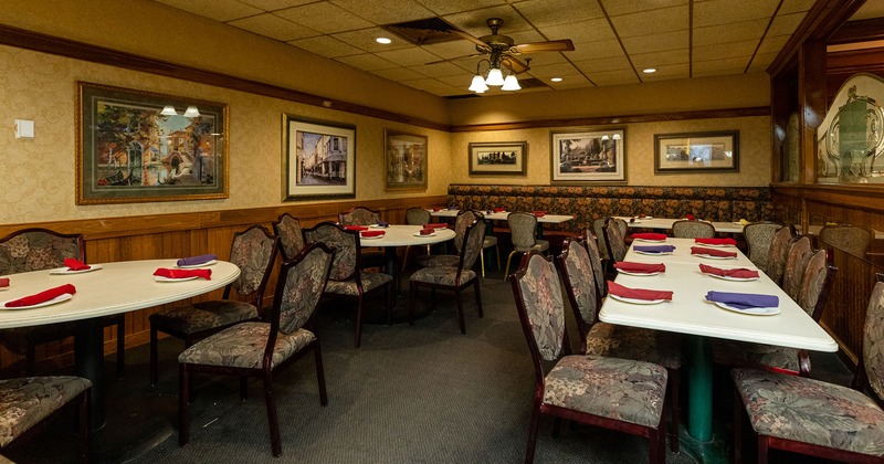 Interior, dining area set for guests