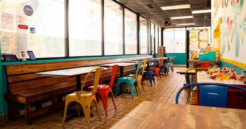 Interior, chairs, tables and wooden bench