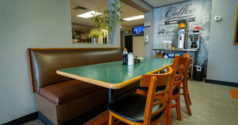 Dining table, chairs and seat close up