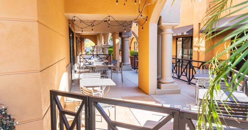 Exterior seating area with chairs and tables