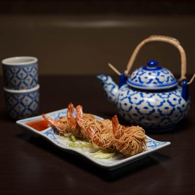 A meal and a porcelain tea set.