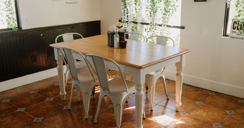 Dining area with wooden tables and chairs
