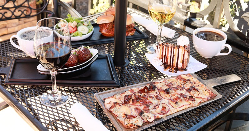 Food and drinks served on a patio table