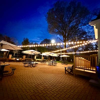 Outside, seating area with lampions.