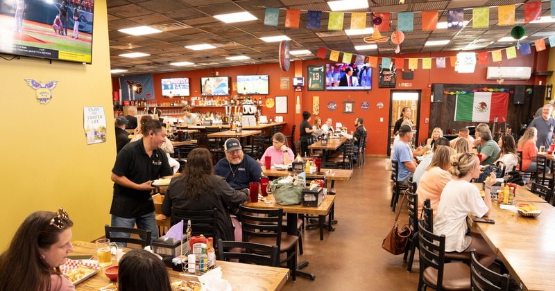Interior, diner area, full of people eating, view above