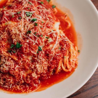 Chicken parmesan, close up.
