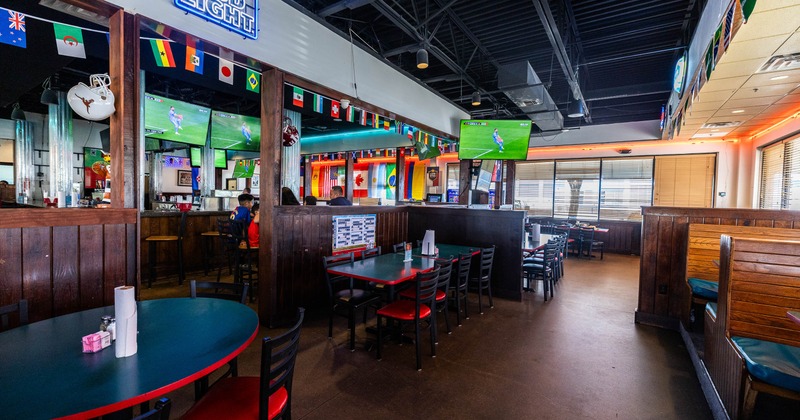 Interior, tables and chairs in dining area