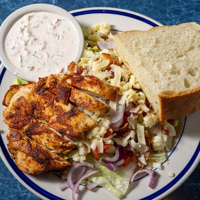 Grilled Cajun Chicken Salad served with cuban bread.