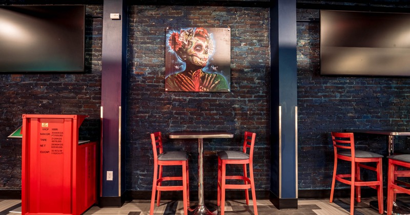 Interior, table for two by a wall