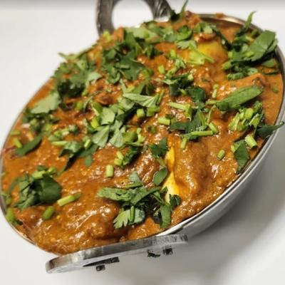 Curry dish with herbs.