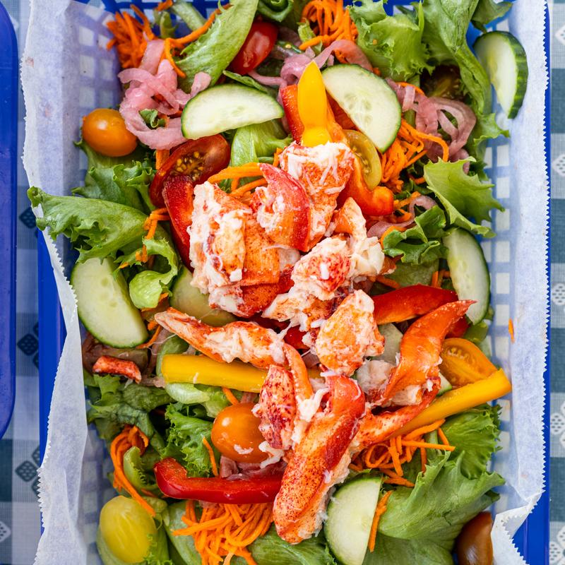Garden salad with lobster, top view