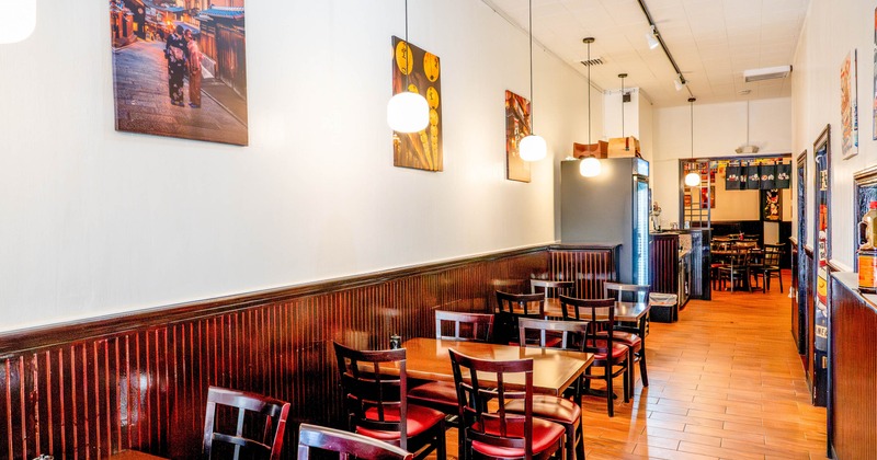 Interior, chairs and tables, paintings on the wall
